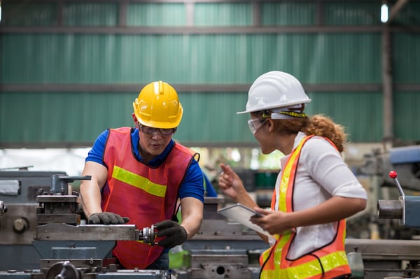 two california manufacturers working in a warehouse