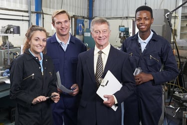 Manager_and_staff_in_engineering_factory_-_shutterstock_238716661